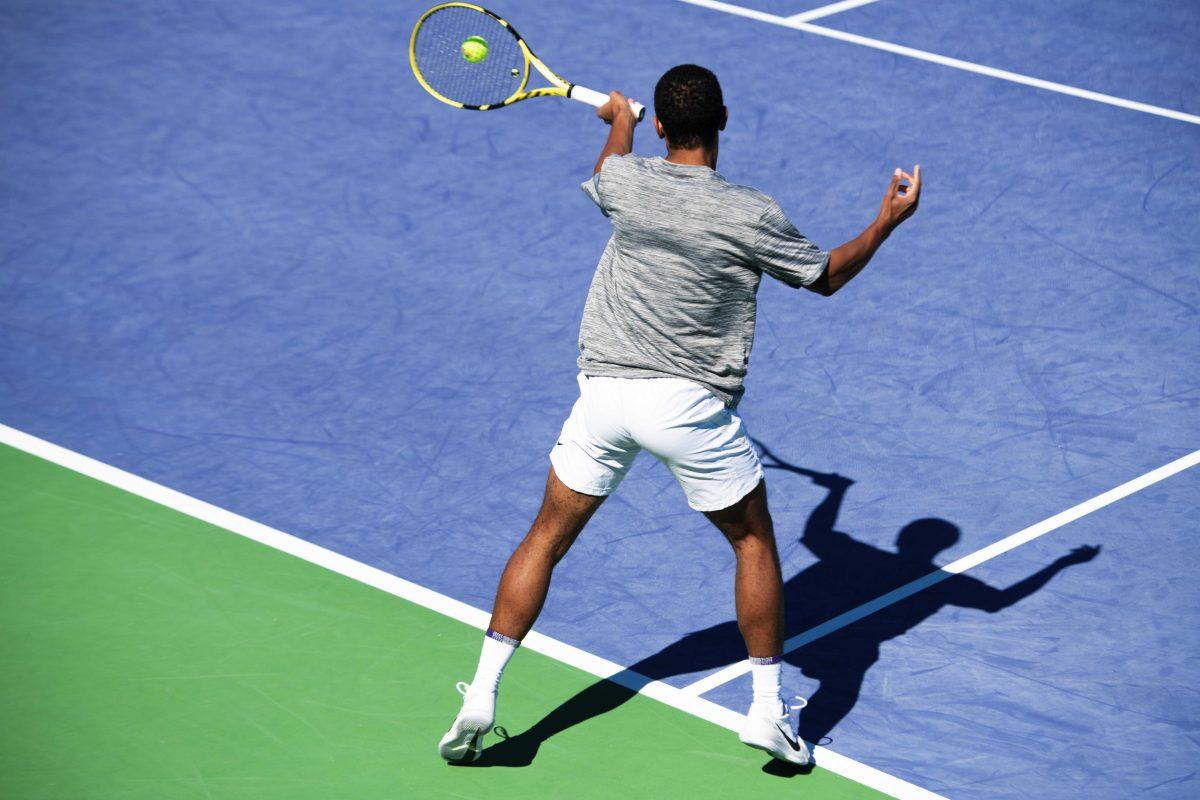 LSU men's tennis junior Kent Hunter hits the ball Sunday, Feb. 13, 2021 during LSU's 6-1 win over Purdue at the LSU Tennis Complex on Gourrier Avenue in Baton Rouge, La.