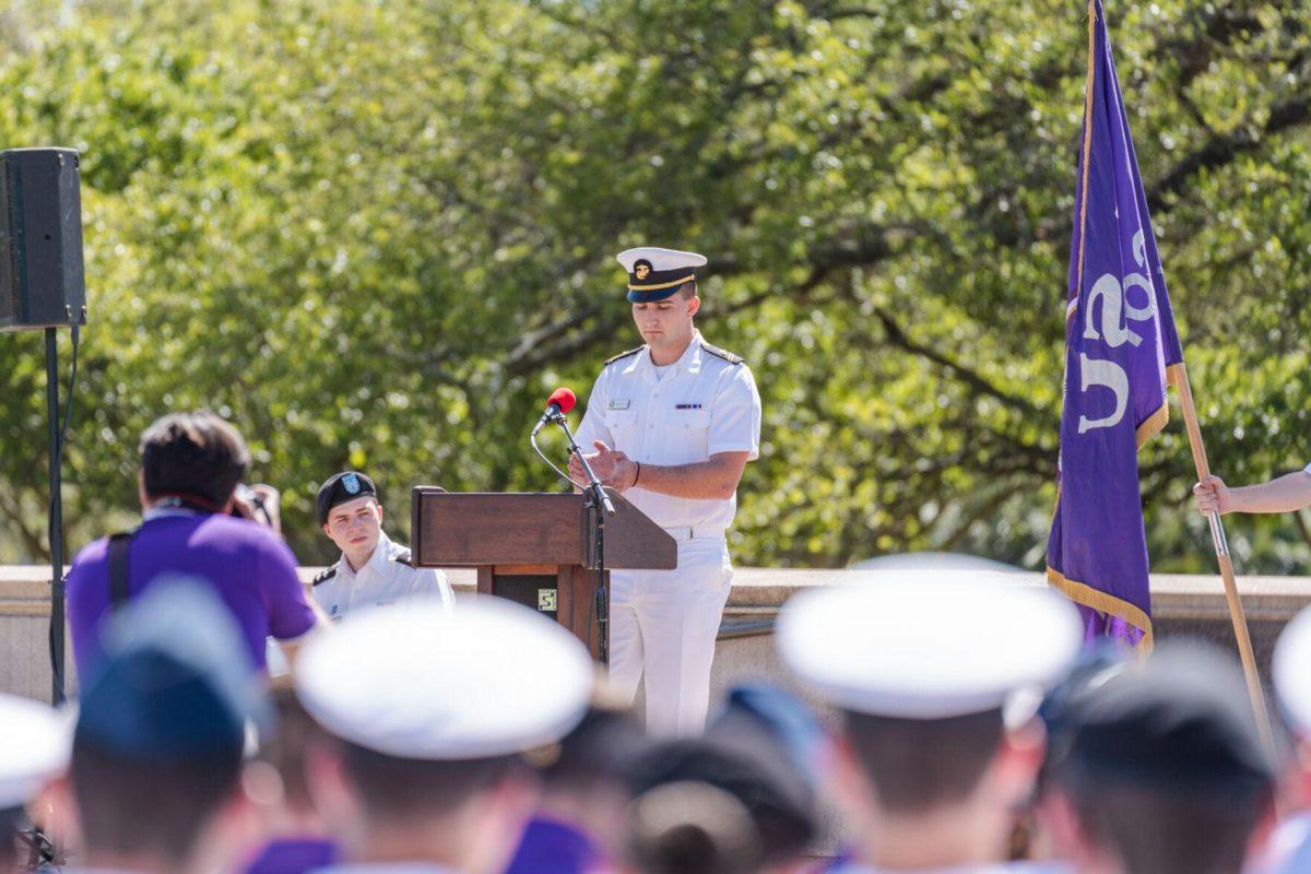 A speaker opens the ceremony on Thursday, April 7, 2022, as the change of command ceremony begins on the LSU Parade Ground on Highland Road in Baton Rouge, La.