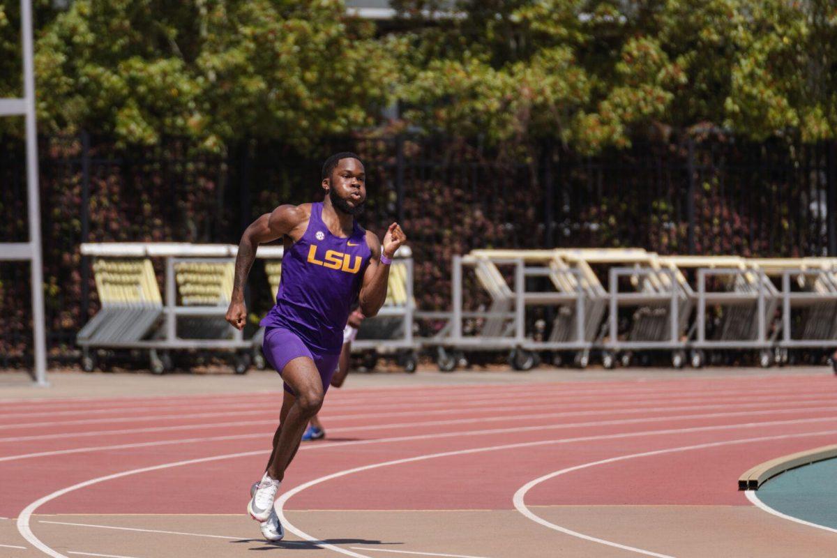 LSU track and field sprints freshman Joel Ekeanyanwu hits the home stretch on Saturday, April 2, 2022, during the 400m dash at the Battle on the Bayou track meet at Bernie Moore Stadium in Baton Rouge, La.