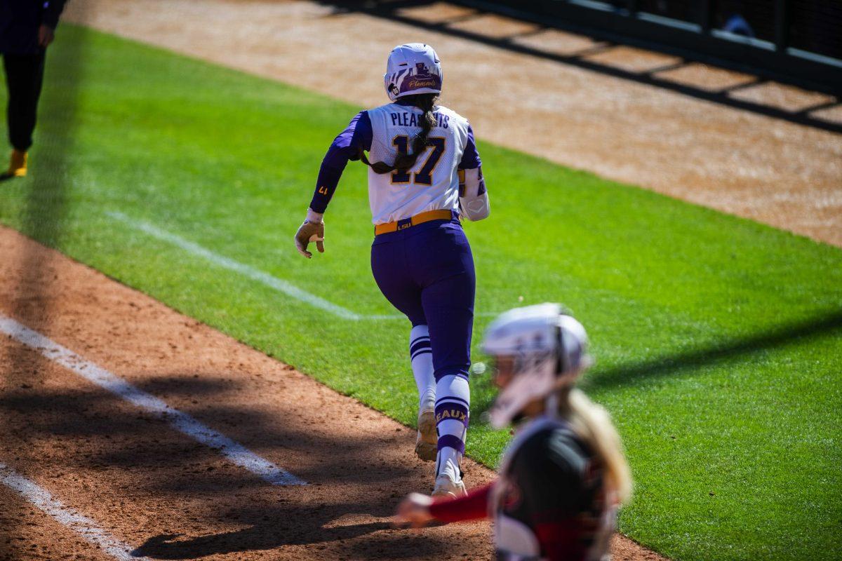 LSU softball redshirt sophomore infielder Taylor Pleasants (17) runs to first Saturday, March 12, 2022 during LSU's 13-6 win against Alabama at Tiger Park in Baton Rouge, La.