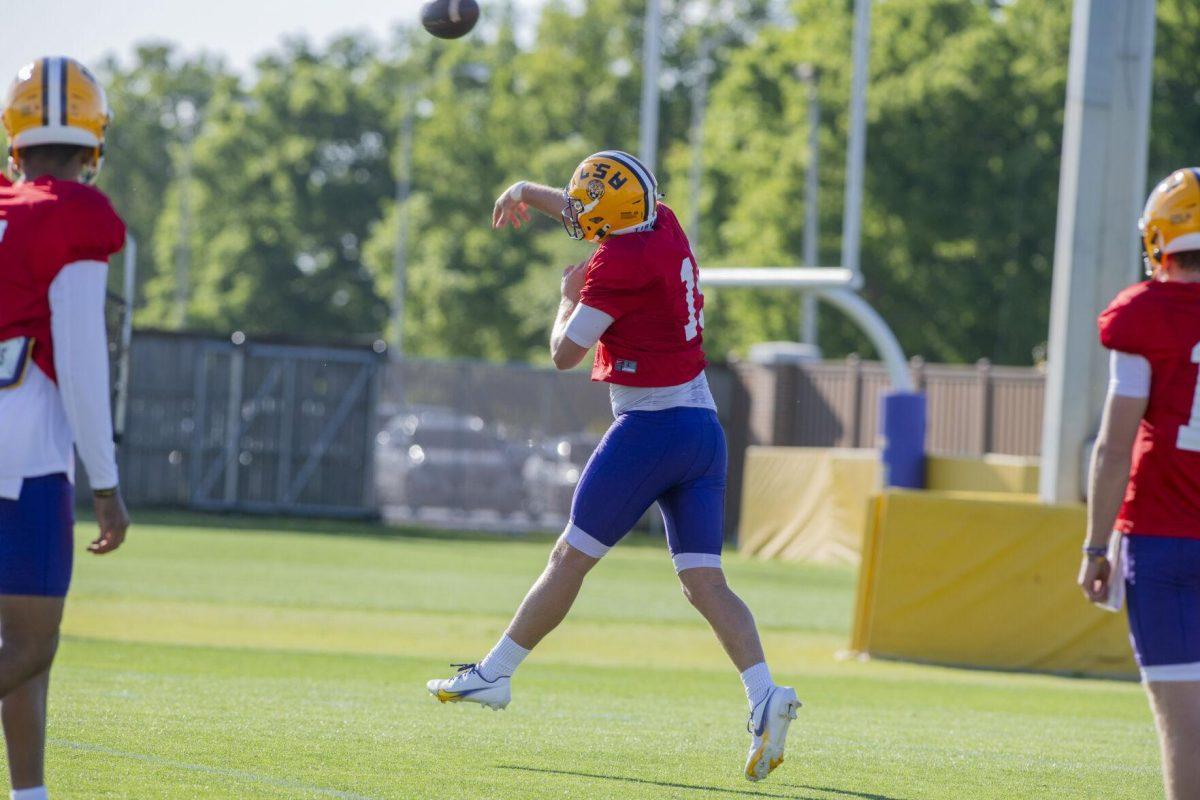 LSU football quarterback Myles Brennan (15) passes the ball Thursday, April 7, 2022, during LSU&#8217;s spring practice in Baton Rouge, Louisiana.