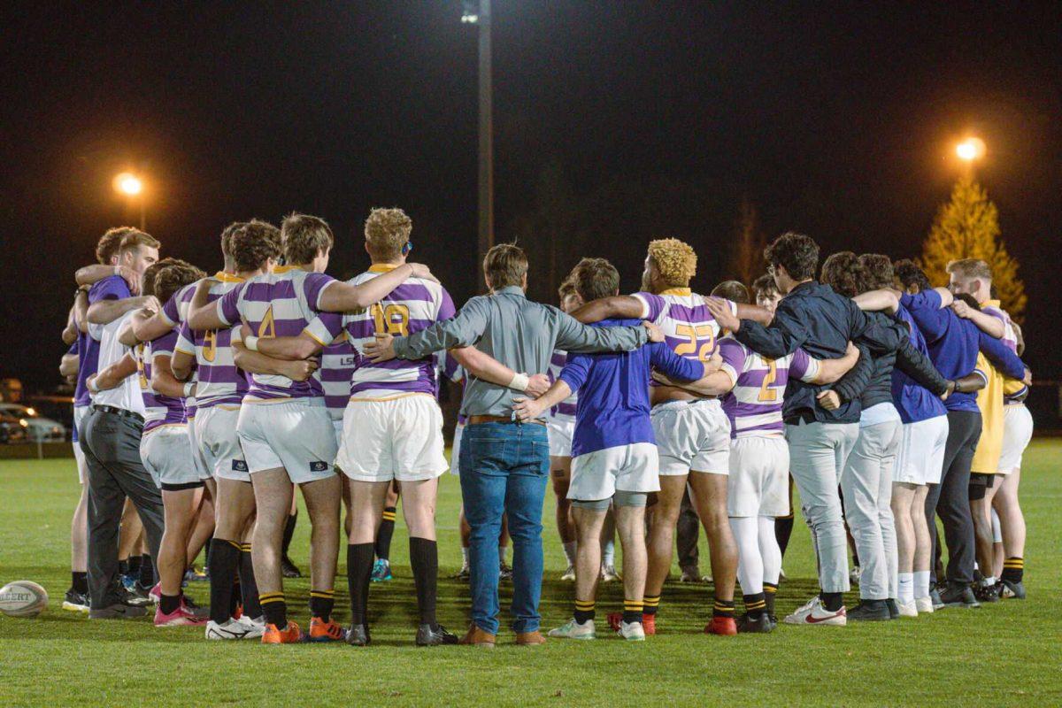 The LSU Rugby team huddles up on Friday, April 8, 2022, after LSU&#8217;s 89-0 win over Tulane at the UREC Fields on Gourrier Avenue in Baton Rouge, La.