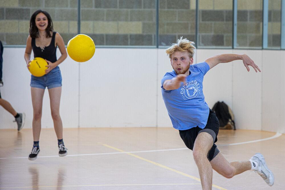 LSU Reveille news reporter John Buzbee hurls a ball at the sports section staff during the Student media dodgeball tournament Saturday, April 9, 2022 at LSU UREC.