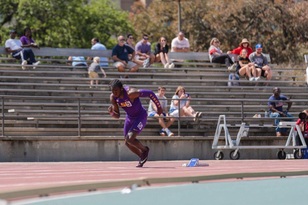 LSU track and field sprints sophomore Sean Burrell starts out the blocks on Saturday, April 2, 2022, during the 400m dash at the Battle on the Bayou track meet at Bernie Moore Stadium in Baton Rouge, La.