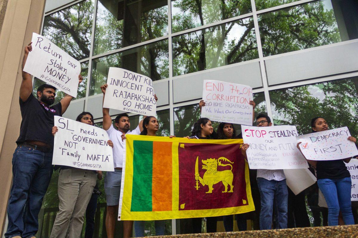 Protesters form up April 24, 2022 in protest against the Sri Lankan government's treatment of their country around free speech plaza on LSU's campus.