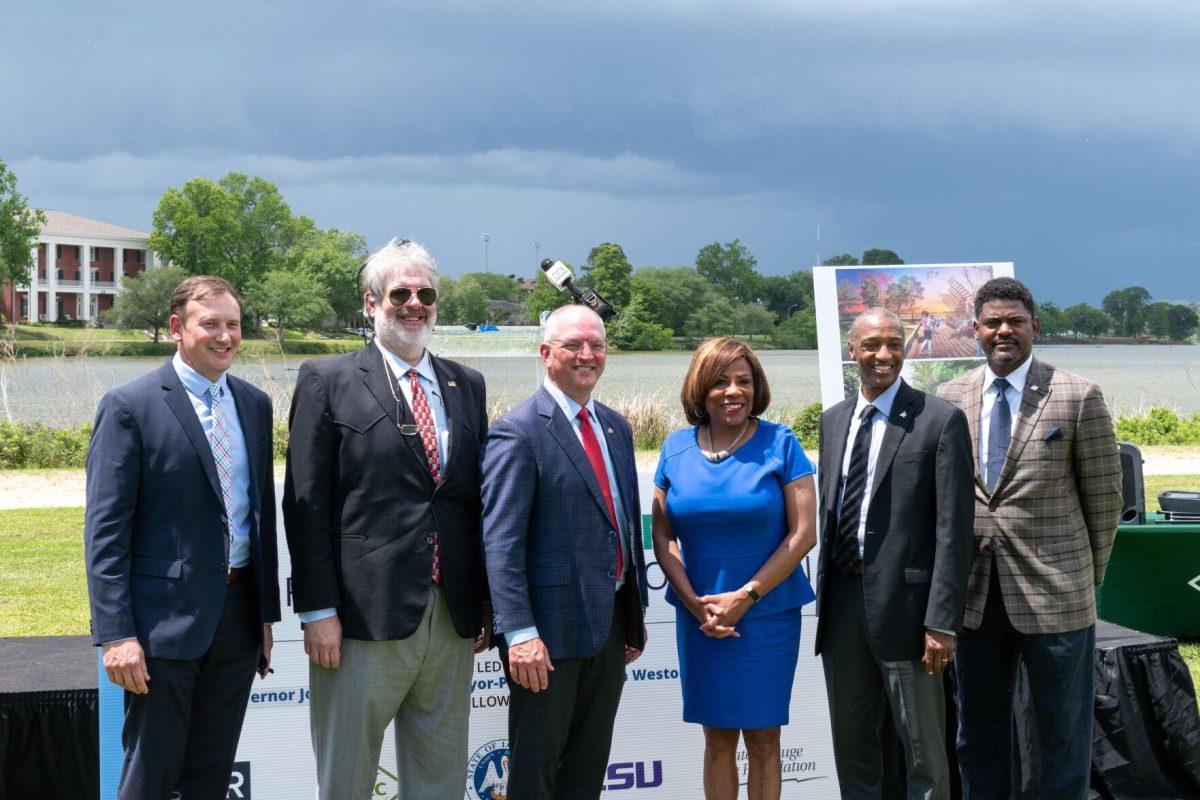 (From left) Baton Rouge Area Foundation CEO, Chris Meyer; LSU board of supervisors chairman, R&#233;my Starns; Governor John Bel Edwards; Mayor-president Sharon Weston Broome; LSU president William F. Tate IV; BREC superintendent, Corey Wilson.