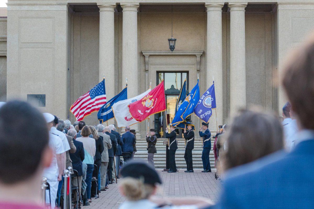 The color guard presents the colors on Thursday, April 7, 2022, during the LSU Memorial Tower Museum ceremony on Tower Drive in Baton Rouge, La.