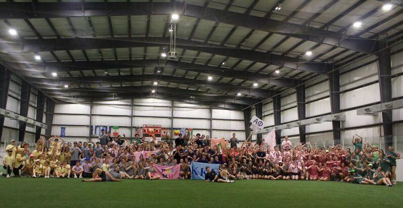 Teams made up of all 12 campus sororities gather with Sigma Chi members in preparation for field games.