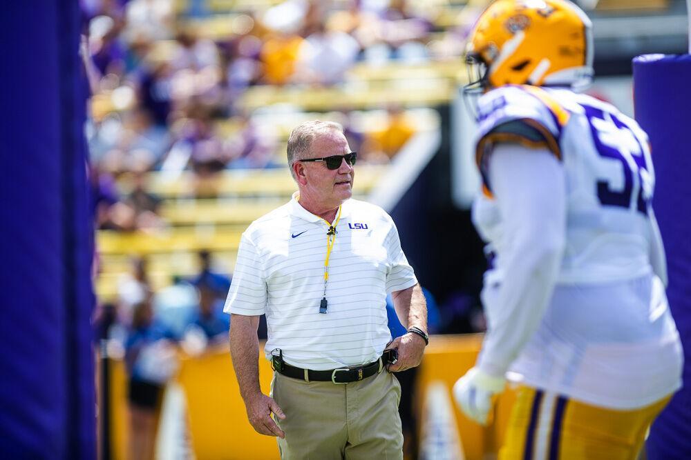 LSU football head coach Brian Kelly watches the team come onto the field for the second half Saturday, April 23, 2022, during LSU football&#8217;s annual spring football game with White winning 51-31 over Purple in Tiger Stadium.