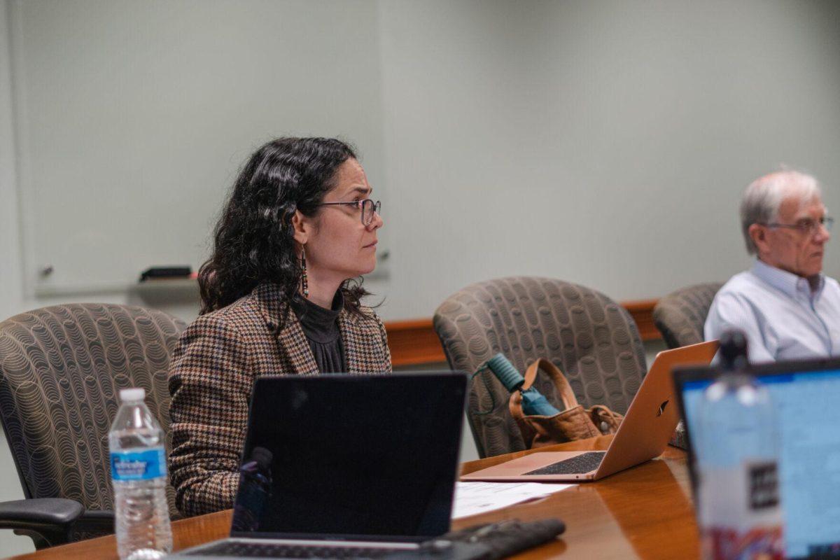 LSU Faculty Senate Member-at-Large Inessa Bazayev listens to President Lopez on Wednesday, April 20, 2022, during the LSU Faculty Senate Executive Committee meeting inside the LSU Student Union on Highland Road in Baton Rouge, La.