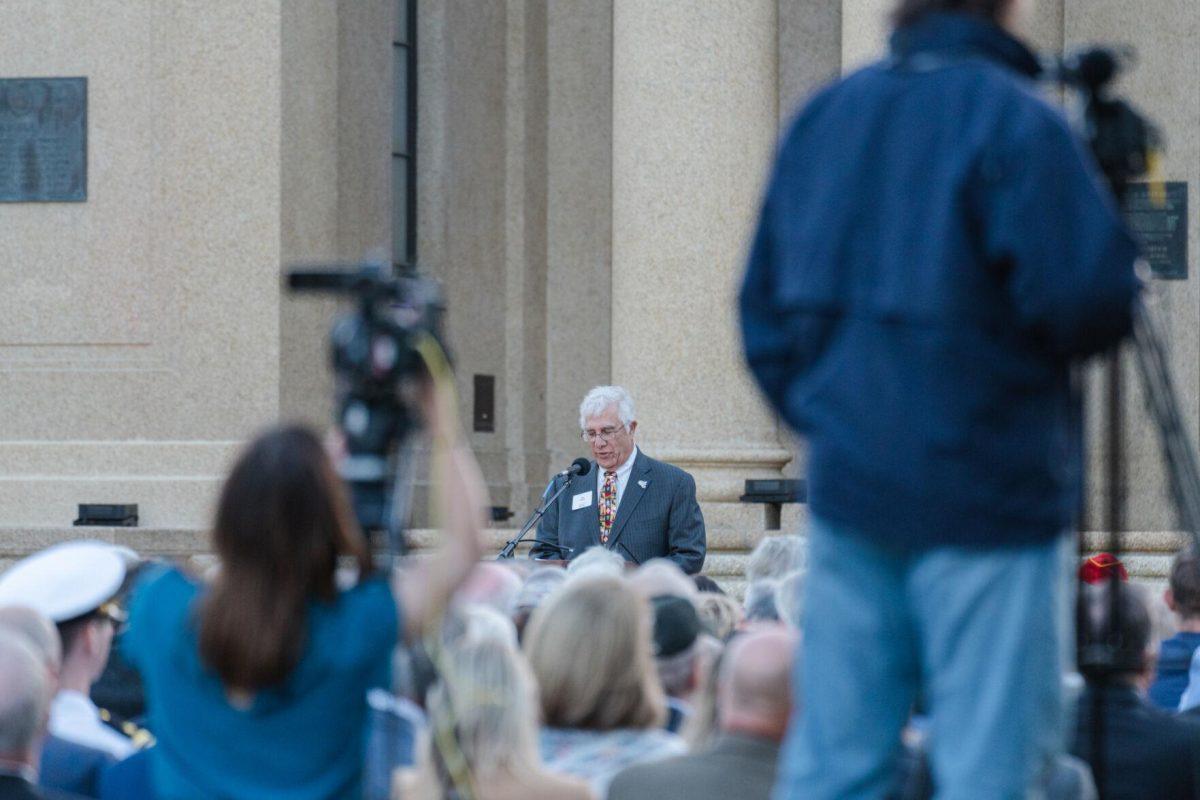 The master of ceremonies begins the proceedings on Thursday, April 7, 2022, during the LSU Memorial Tower Museum ceremony on Tower Drive in Baton Rouge, La.