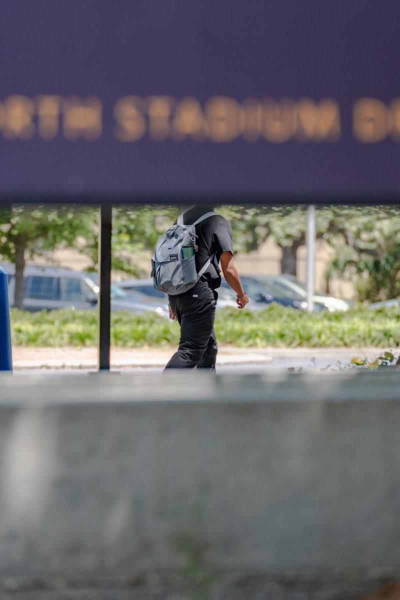 The Journalism building sign creates the appearance of being headless for a passerby on Tuesday, April 19, 2022, on North Stadium Drive in Baton Rouge, La.