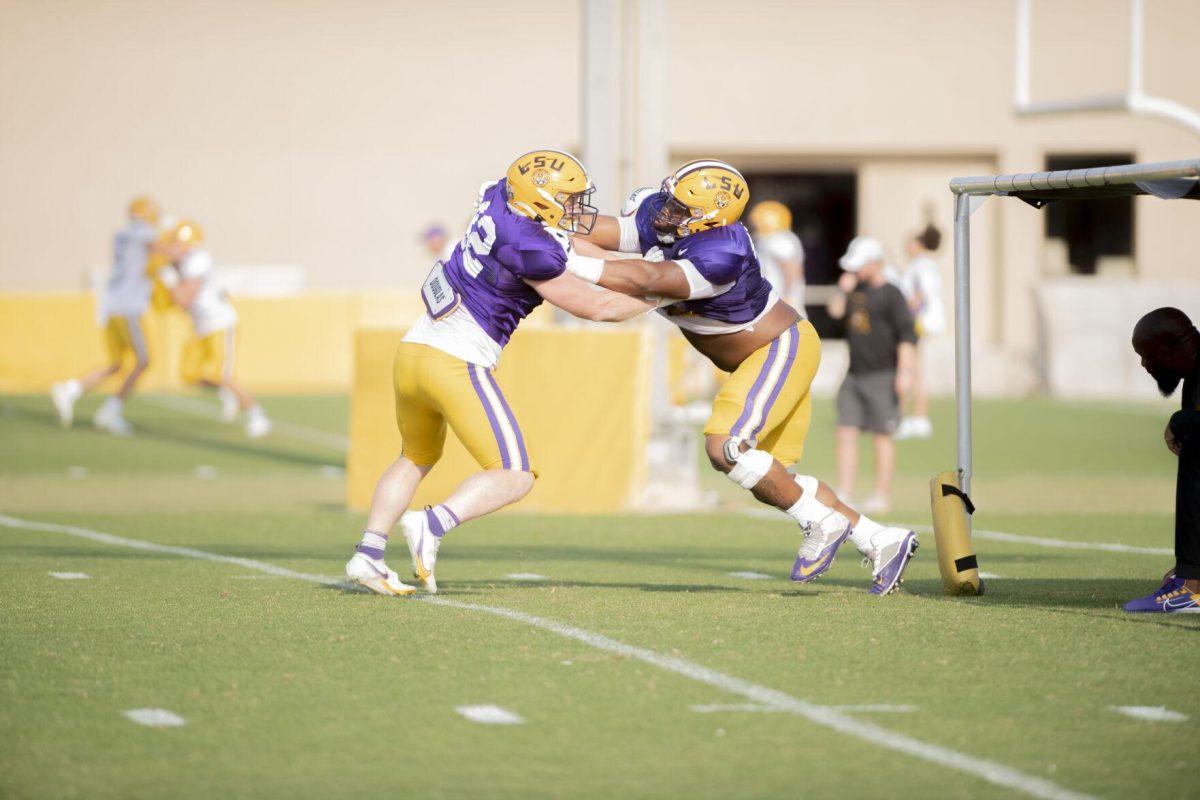 LSU football defensive tackle lane Blue (42) and Jacobian Guillory (90) practice defense Thursday, April 21, 2022, during LSU&#8217;s spring practice in Baton Rouge, Louisiana.