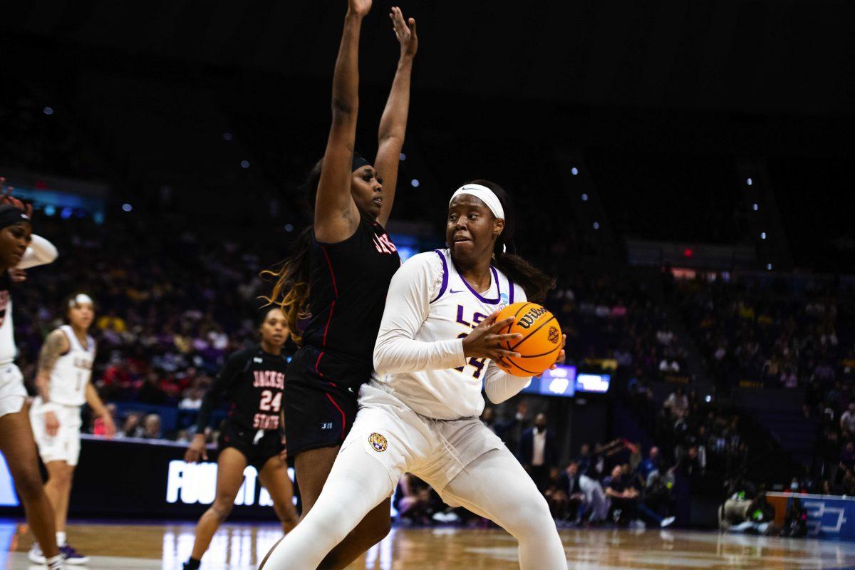 LSU women&#8217;s basketball graduate student center Faustine Aifuwa (24) holds the ball Saturday, March 19, 2022, during LSU&#8217;s 83-77 win against Jackson State in the first round of the NCAA women&#8217;s basketball tournament in the Pete Maravich Assembly Center on North Stadium Drive in Baton Rouge, La.