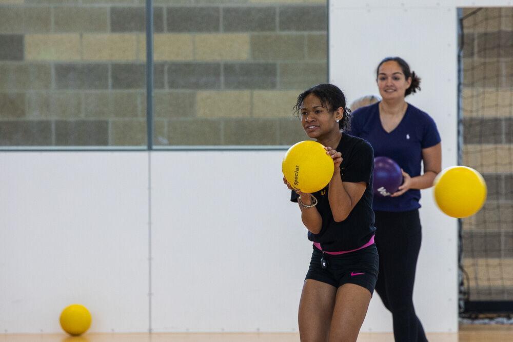 LSU Reveille news witer Chandler McIntosh deflects balls during the Student media dodgeball tournament Saturday, April 9, 2022 at LSU UREC.