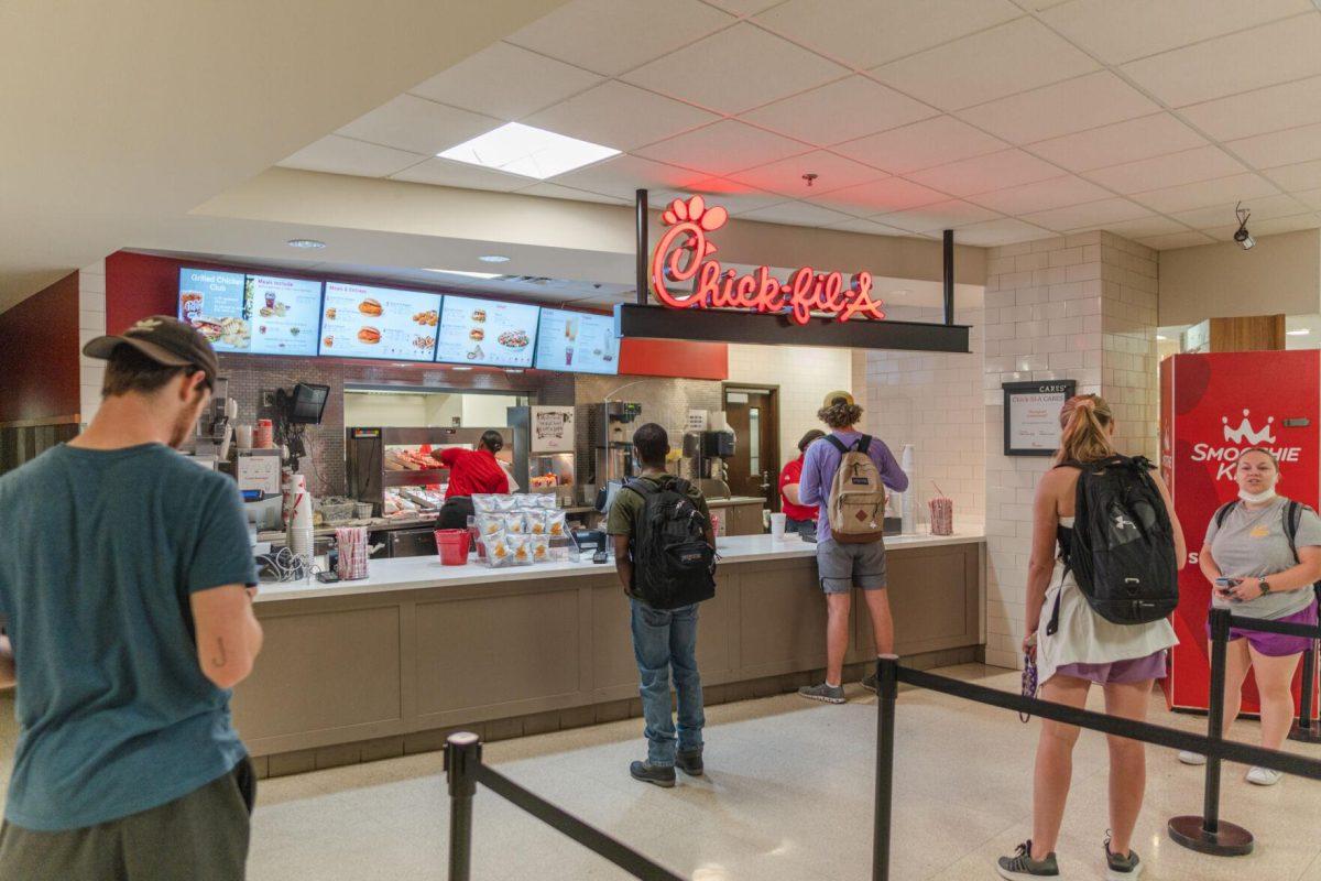 Students stand in line on Monday, April 11, 2022, at Chick-fil-A inside the LSU Student Union on Highland Road in Baton Rouge, La.