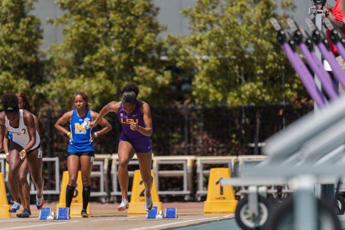 LSU track and field sprints freshman Hannah Douglas explodes out the blocks on Saturday, April 2, 2022, during the 100m dash at the Battle on the Bayou track meet at Bernie Moore Stadium in Baton Rouge, La.