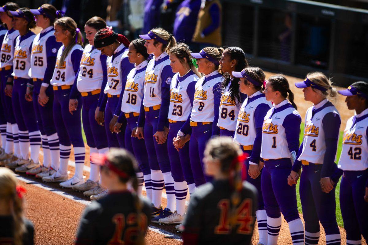 LSU softball stands for the national anthem Saturday, March 12, 2022 before LSU's 13-6 win against Alabama at Tiger Park in Baton Rouge, La.