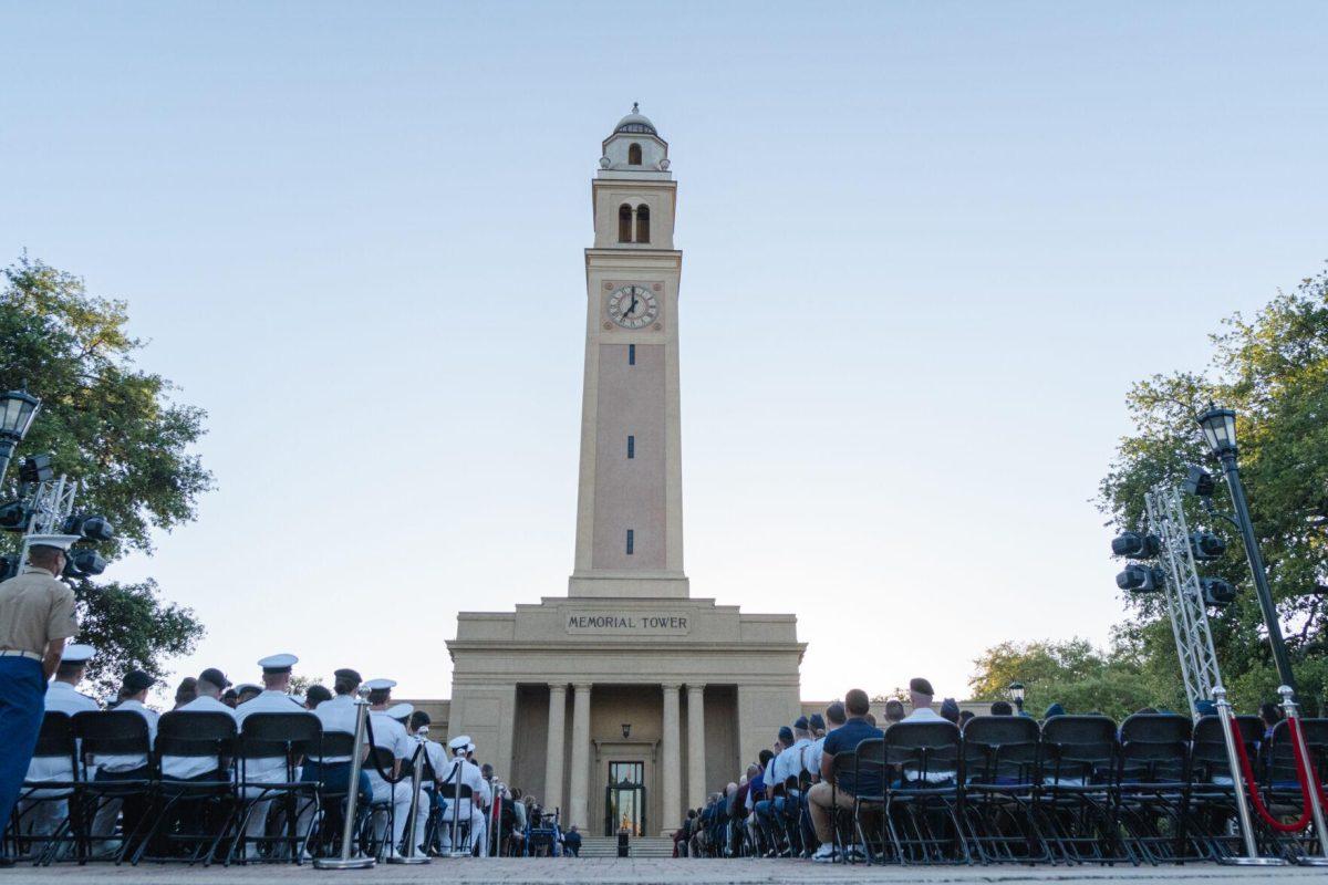 Memorial Tower rises above the crowd on Thursday, April 7, 2022, during the LSU Memorial Tower Museum ceremony on Tower Drive in Baton Rouge, La.