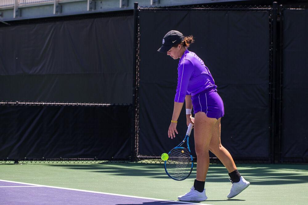 LSU women&#8217;s tennis junior Nina Geissler bounces the ball before serving Friday, April 8, 2022, during LSU&#8217;s 7-0 loss against Texas A&amp;M in the LSU Tennis Complex on Gourrier Avenue in Baton Rouge.