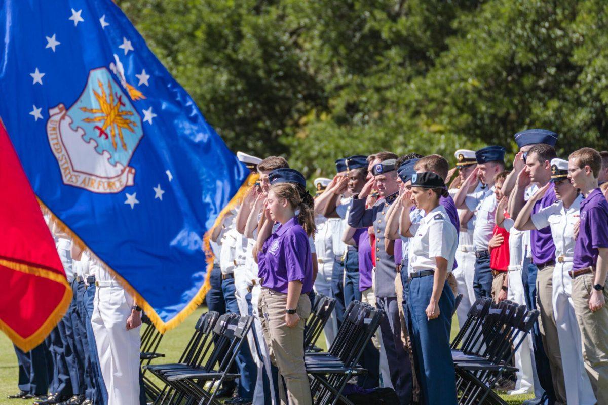 Members of the LSU ROTC salute during the anthem on Thursday, April 7, 2022, at the change of command ceremony on the LSU Parade Ground on Highland Road in Baton Rouge, La.