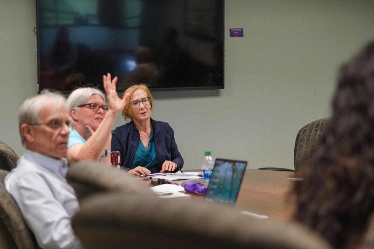 The LSU Faculty Senate Executive Committee discusses open meeting law with the lawyers present on Wednesday, April 20, 2022, inside the LSU Student Union on Highland Road in Baton Rouge, La.