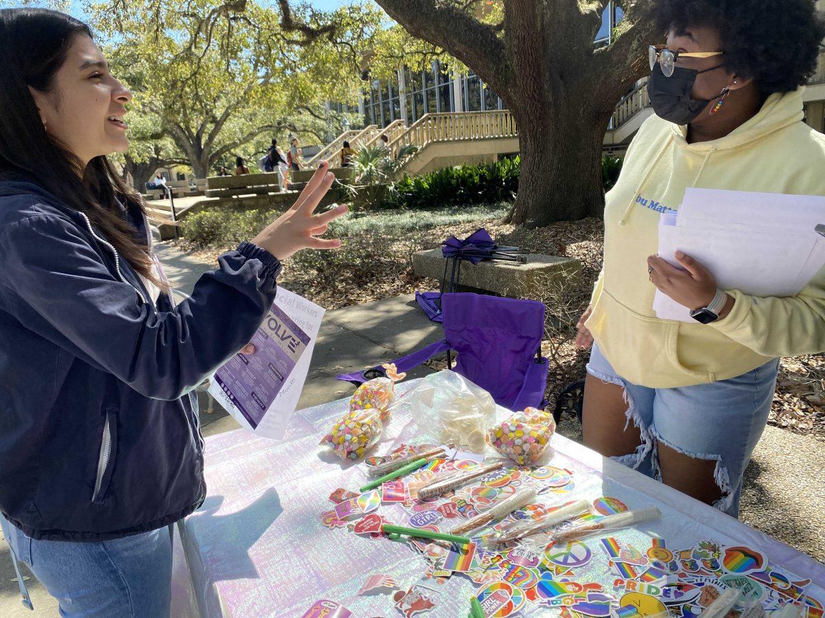 Members of the Social Workers Advocating for Equality club set up a table Friday March 25 in Free Speech Alley in Baton Rouge, La.