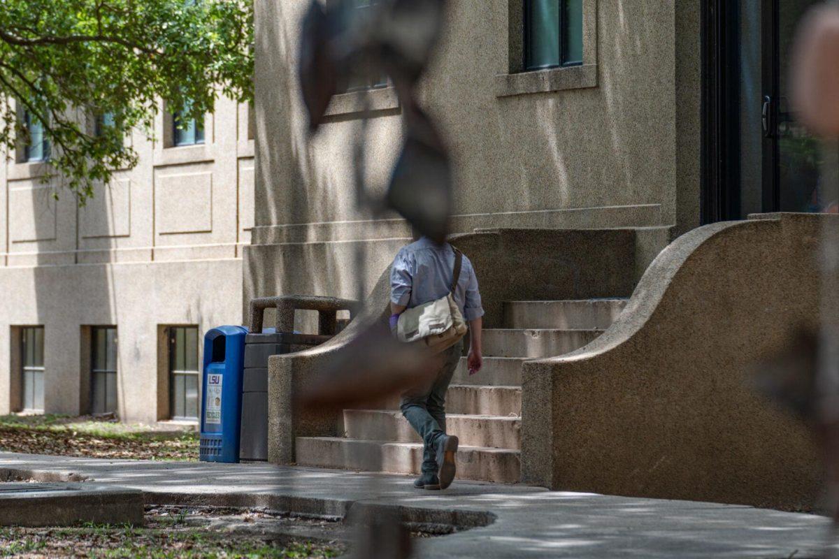 A sculpture in the art garden renders the person strolling by headless on Tuesday, April 19, 2022, near the LSU Quad in Baton Rouge, La.