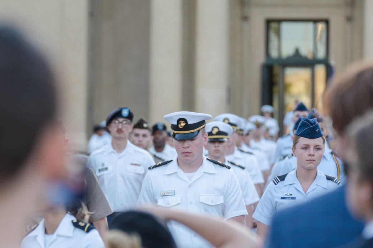 Cadets take their seats on Thursday, April 7, 2022, during the LSU Memorial Tower Museum ceremony on Tower Drive in Baton Rouge, La.