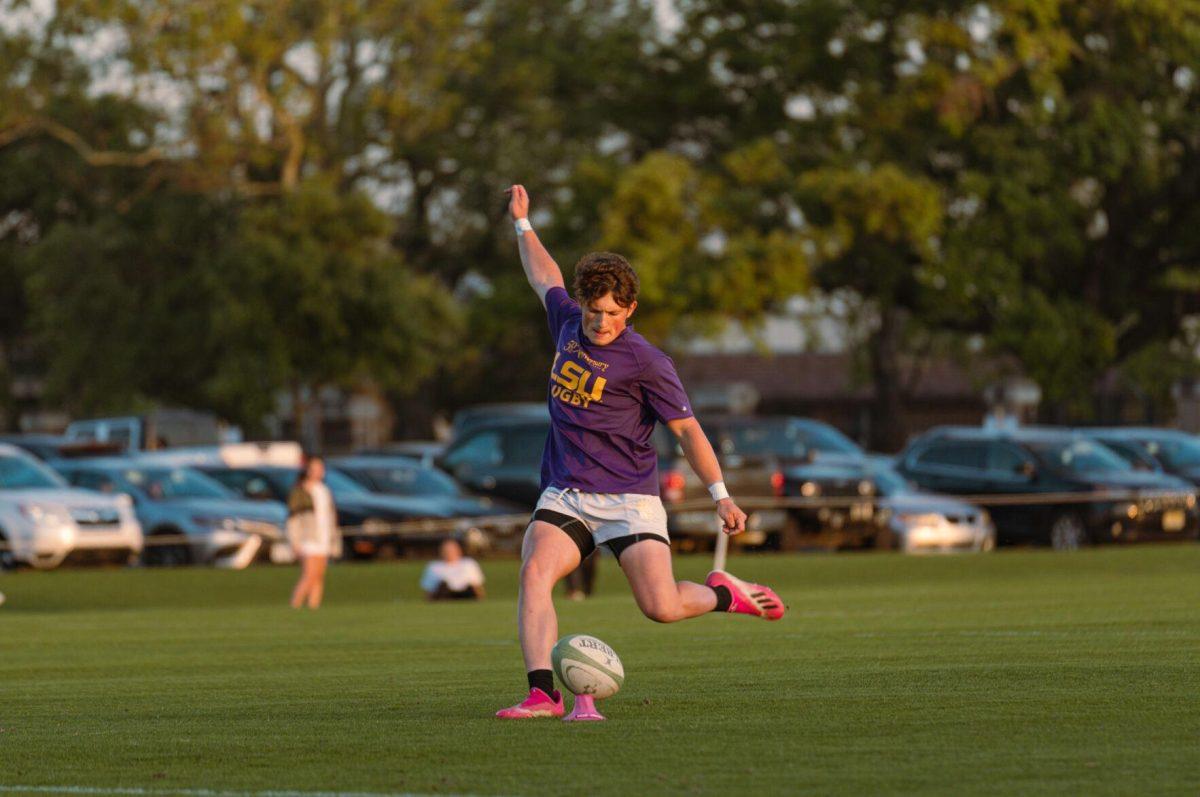 LSU Rugby scrumhalf Cade Austin practices a kick on Friday, April 8, 2022, prior to their match against Tulane at the UREC Fields on Gourrier Avenue in Baton Rouge, La.