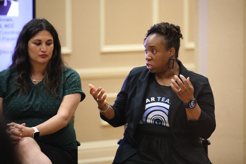 Deputy Title IX Coordinator for Training and Prevention Miranda Brown replies to a student&#8217;s question during the Title IX round table discussion Tuesday, April 5, 2022, in the Student Union on LSU&#8217;s campus.