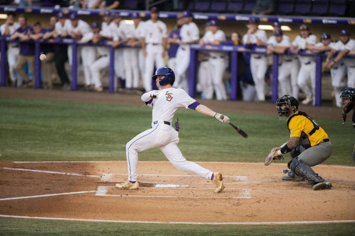 LSU baseball redshirt sophomore infielder Cade Doughty (4) swings at the ball Thursday, April 21, 2022, during the game against the University of Missouri at Alex Box Stadium on Gourrier Avenue in Baton Rouge, Louisiana.