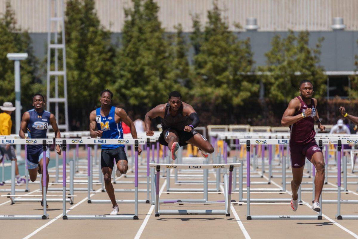 Tiger Olympian Arthur Price knocks over the last hurdle on Saturday, April 2, 2022, during the 110m hurdles at the Battle on the Bayou track meet at Bernie Moore Stadium in Baton Rouge, La.