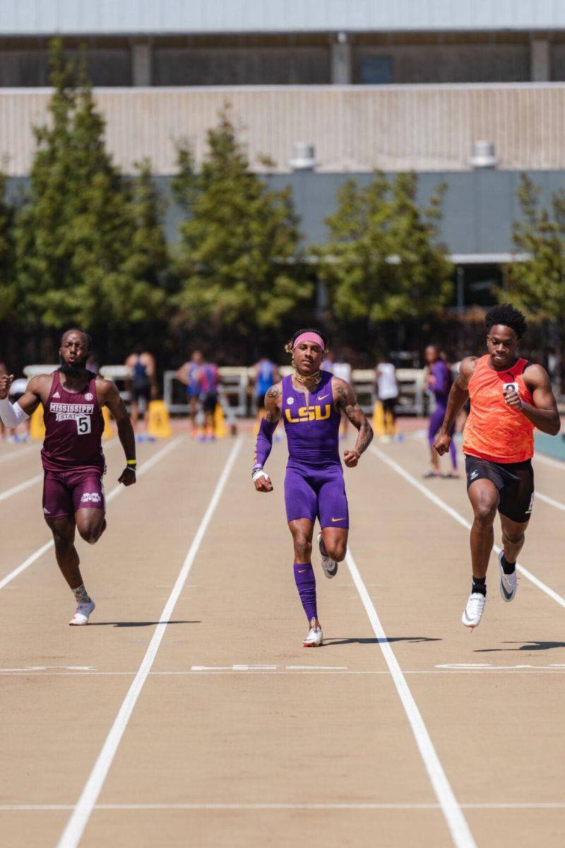 LSU track and field sprints junior Eric Edwards Jr. nears the finish line on Saturday, April 2, 2022, during the 100m dash at the Battle on the Bayou track meet at Bernie Moore Stadium in Baton Rouge, La.