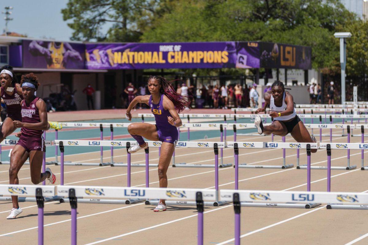 LSU track and field sprints sophomore Leah Phillips powers through the hurdles on Saturday, April 2, 2022, during the 100m hurdles at the Battle on the Bayou track meet at Bernie Moore Stadium in Baton Rouge, La.