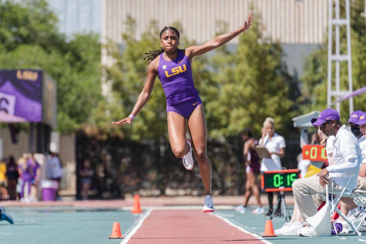 LSU track and field jumps sophomore Serena Bolden leaps off the takeoff board on Saturday, April 2, 2022, during the triple jump event at the Battle on the Bayou track meet at Bernie Moore Stadium in Baton Rouge, La.