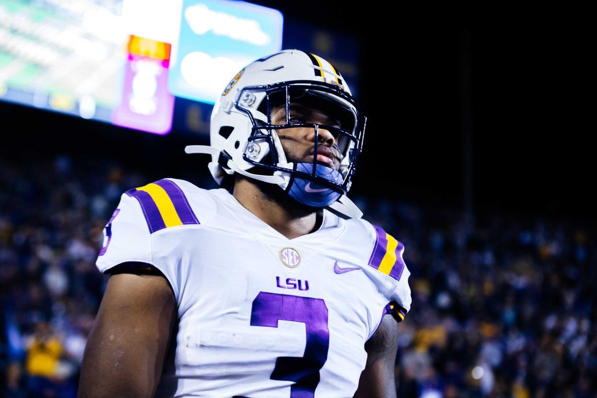 LSU football junior running back Tyrion Davis-Price (3) walks onto the field Saturday, Nov. 27, 2021, before LSU's 27-24 win against Texas A&amp;M at Tiger Stadium in Baton Rouge, La.