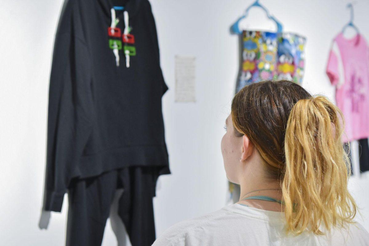 A visitor visits the &#8220;What I Wore&#8221; Exhibit Wednesday, April 6, 2022, in the Art Gallery of the LSU Student Union in Baton Rouge, Louisiana.