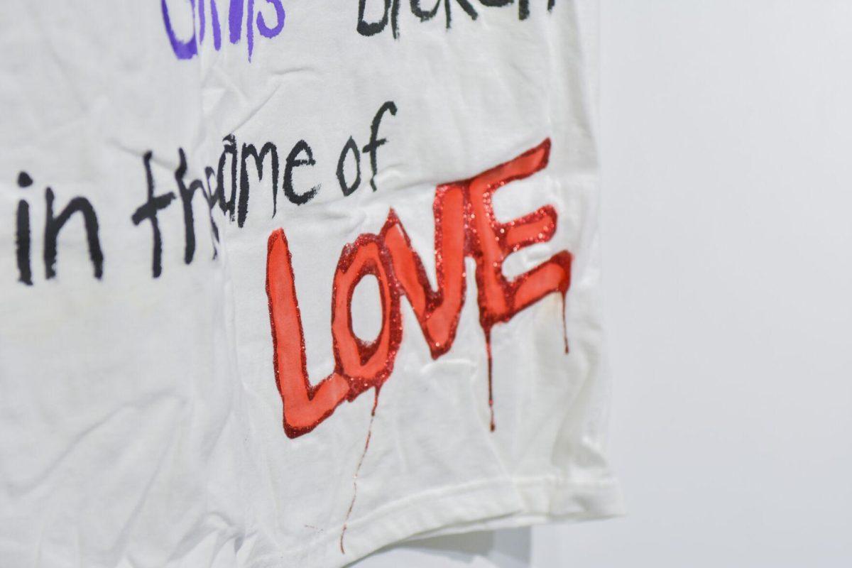 A shirt with the word &#8220;Love&#8221; is displayed Wednesday, April 6, 2022, in the Art Gallery of the LSU Student Union in Baton Rouge, Louisiana.