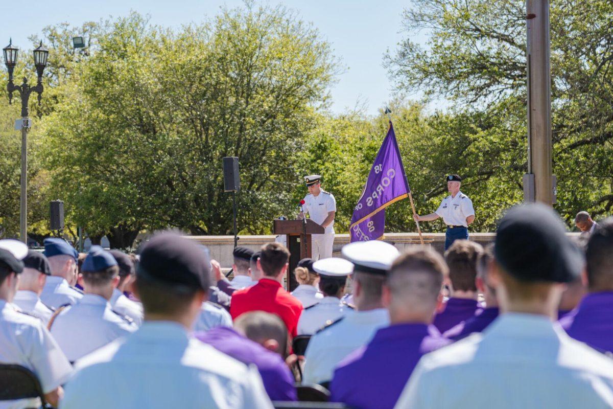 A speaker opens the ceremony on Thursday, April 7, 2022, as the change of command ceremony begins on the LSU Parade Ground on Highland Road in Baton Rouge, La.