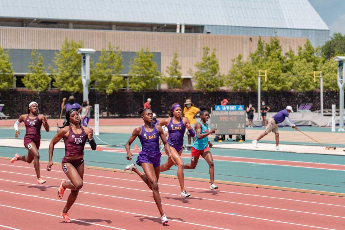 LSU track and field sophomores Favour Ofili (left) and Amber Anning (right) come down the home stretch during the 400-meter final on April 24, 2021 at the LSU Alumni Gold meet at Bernie Moore Track Stadium on North Stadium Dr in Baton Rouge.