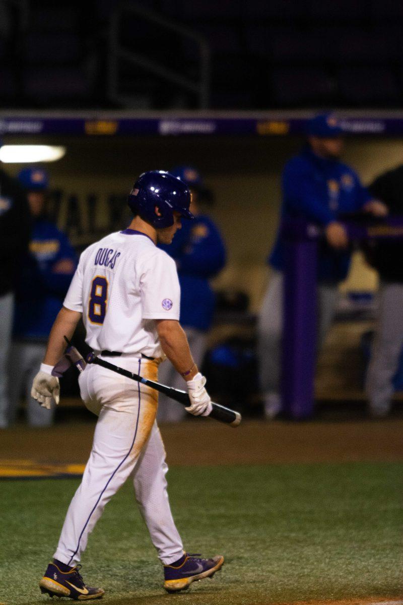 LSU baseball redshirt junior infielder Gavin Dugas (8) prepares for his at bat Wednesday, March 9, 2022 before LSU's 6-3 win against McNeese at Alex Box Stadium on Gourrier Avenue in Baton Rouge, La.