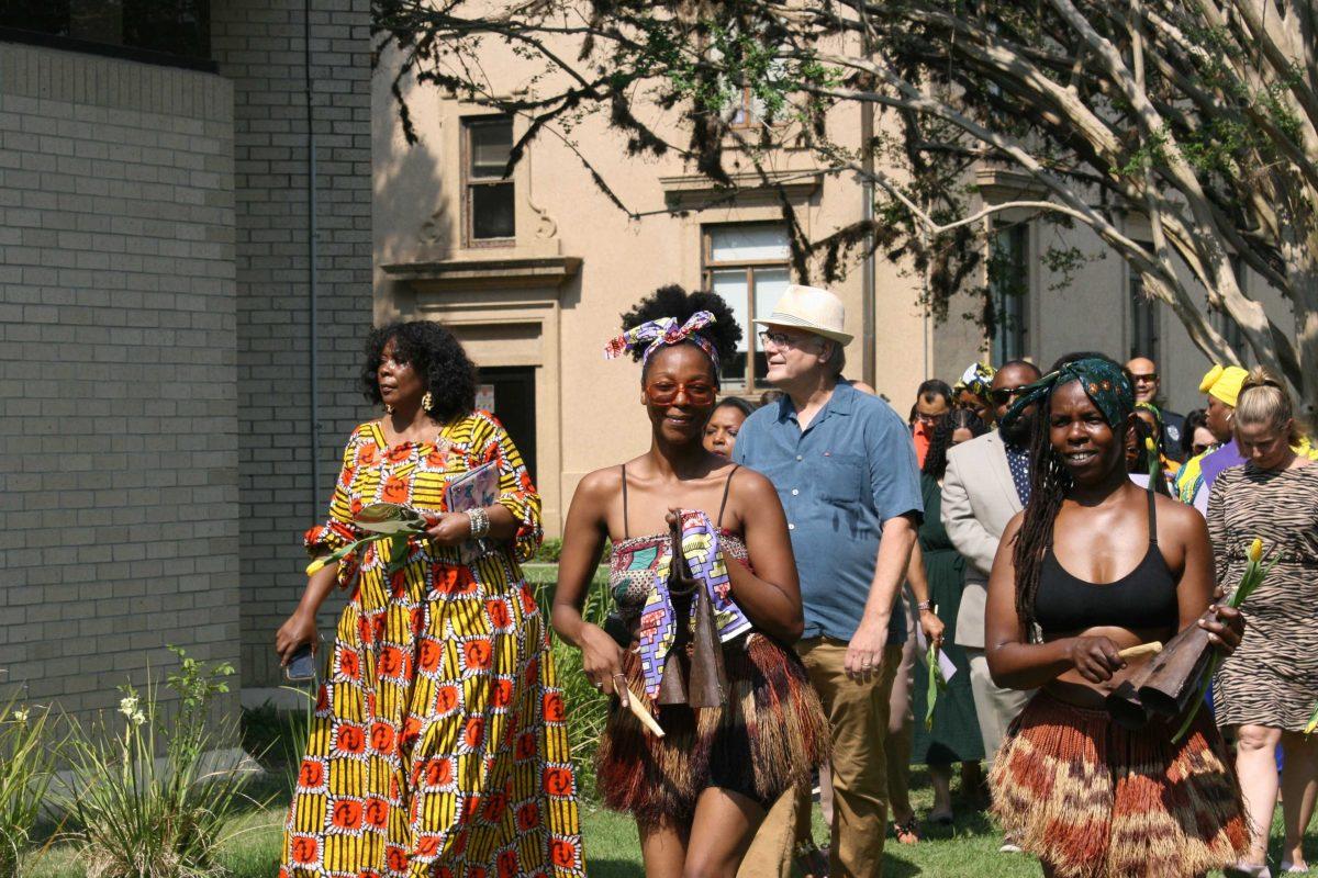 Participants march from Pleasant Hall to the Student Health Center on Wednesday, May 12, 2022.