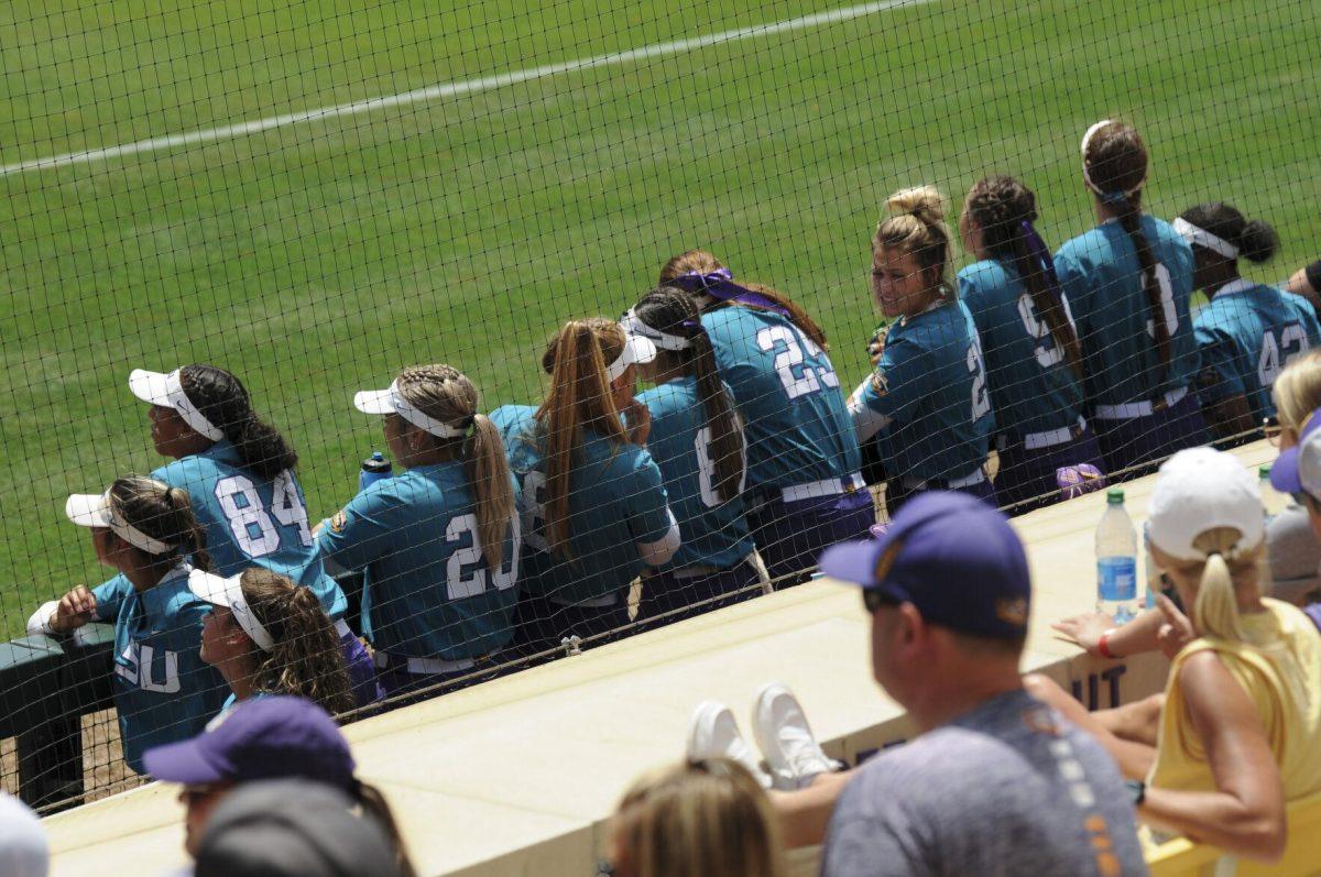 The LSU softball team watches and cheers from the dugout Saturday, April 30, 2022, during LSU&#8217;s 6-1 defeat against Florida at Tiger Park on Skip Bertman Drive in Baton Rouge, La.