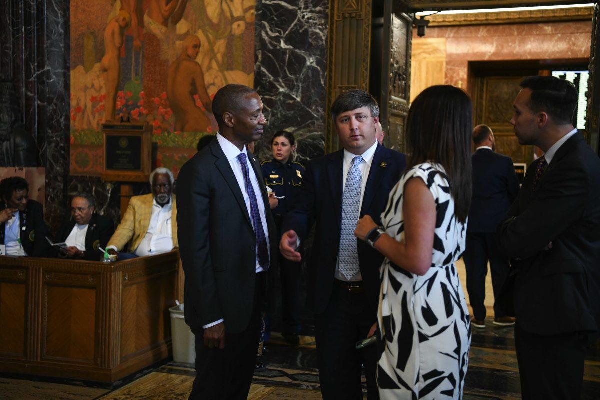 LSU President William F. Tate speaks with Senator Stewart Cathey Jr. Wednesday, April 20, 2022, during the annual LSU Day at the Capitol at the Louisiana State Capitol in Baton Rouge, La.