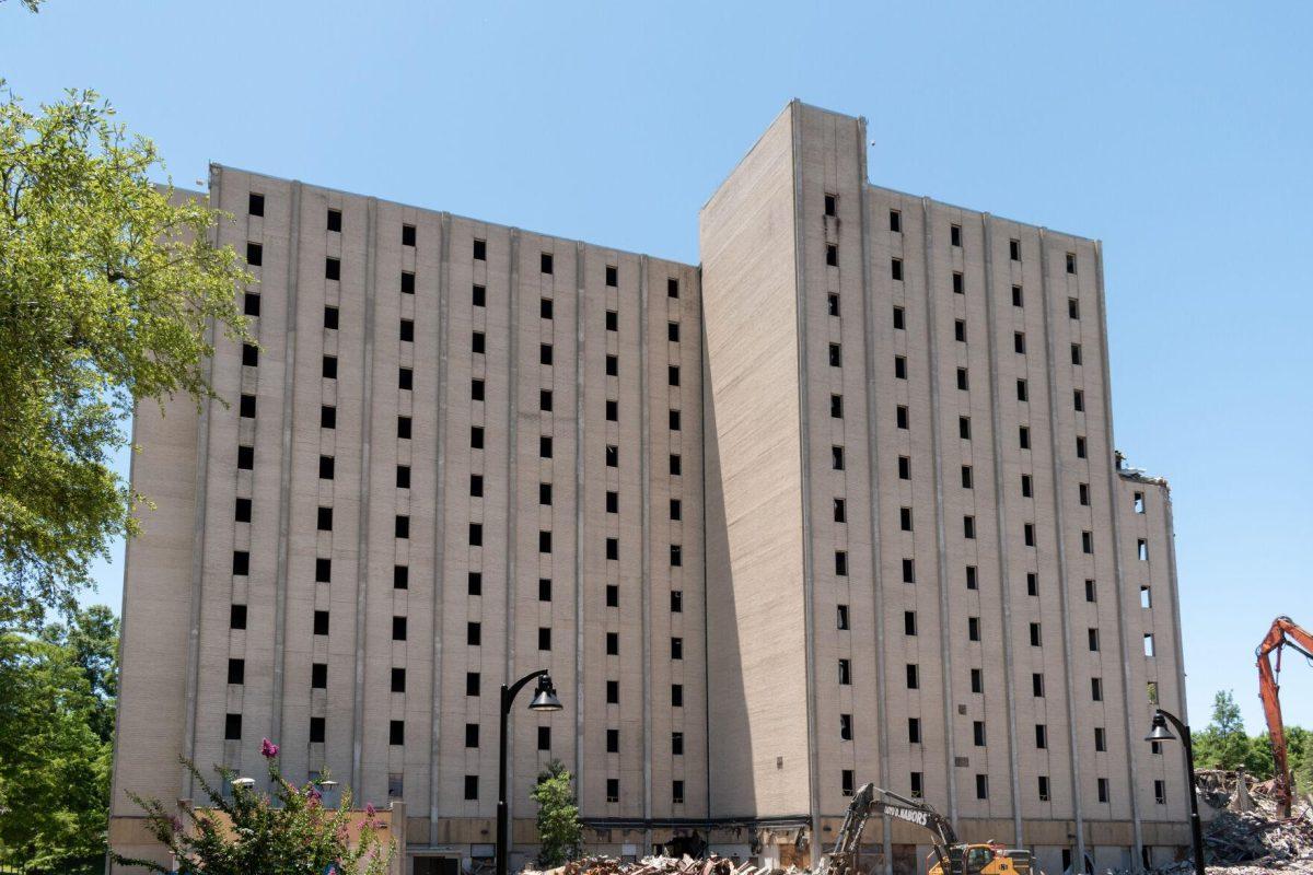 Lower portions of the front of Kirby Smith Hall have been stripped away Thursday, May 26, 2022.