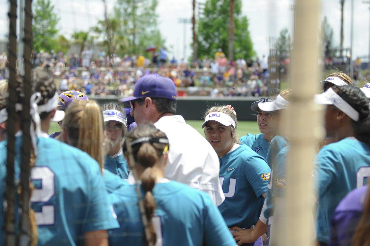 LSU softball Assistant Coach Howard Dobson speaks to the team Saturday, April 30, 2022, during LSU&#8217;s 6-1 defeat against Florida at Tiger Park on Skip Bertman Drive in Baton Rouge, La.