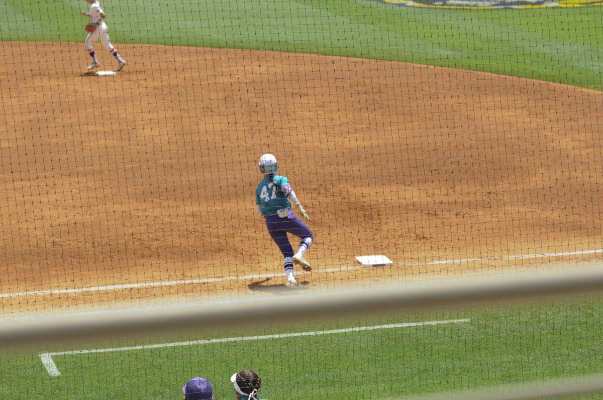 LSU freshman outfielder McKenzie Redoutey (4) runs the bases Saturday, April 30, 2022, during LSU&#8217;s 6-1 defeat against Florida at Tiger Park on Skip Bertman Drive in Baton Rouge, La.