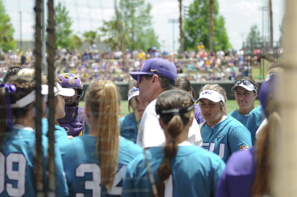 LSU softball Assistant Coach Howard Dobson speaks to the team Saturday, April 30, 2022, during LSU&#8217;s 6-1 defeat against Florida at Tiger Park on Skip Bertman Drive in Baton Rouge, La.