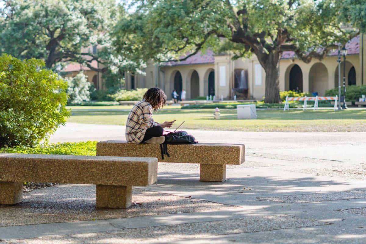 An LSU student studies on Wednesday, May 4, 2022, in the LSU Quad in Baton Rouge, La.